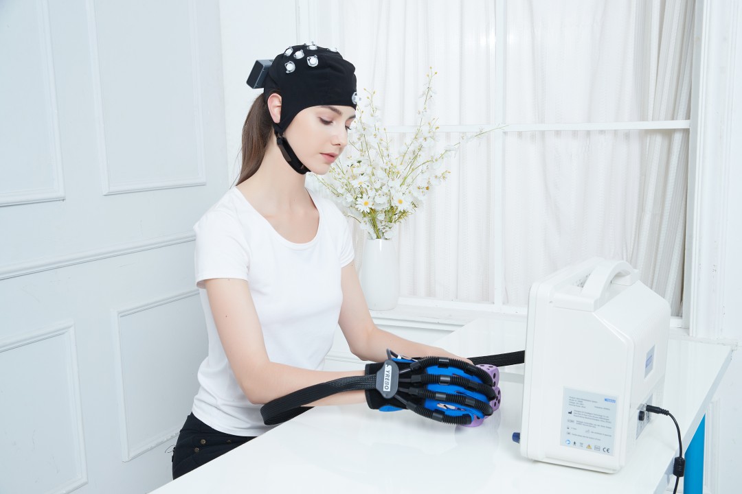 A BCI-controlled soft robotic glove turns movement intention into assisted hand training.